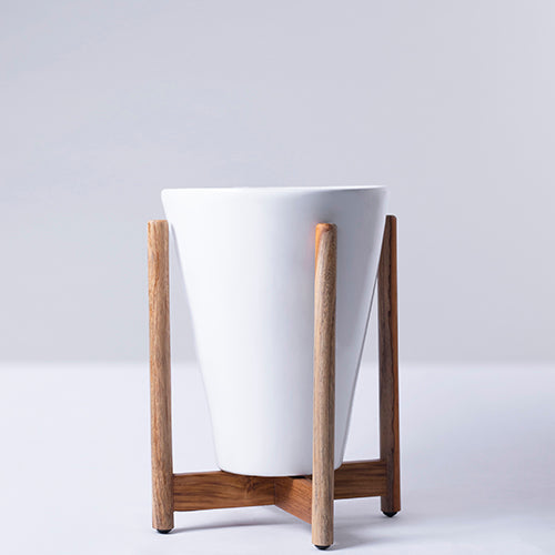 Large Size Love Bite ceramic planter with wooden stand in white color.