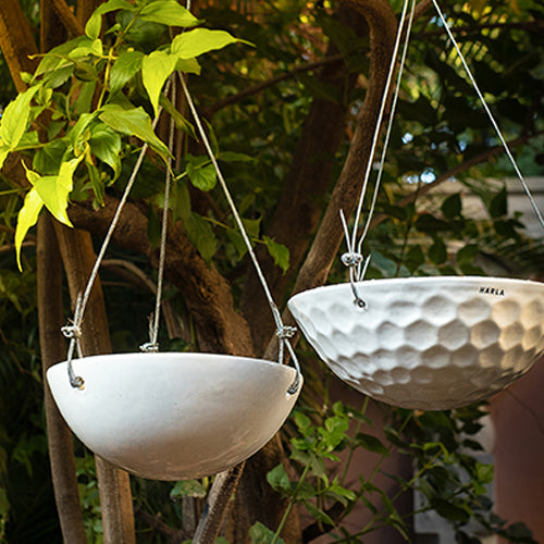 Petrichor Smite Hanging Planters in white colour.