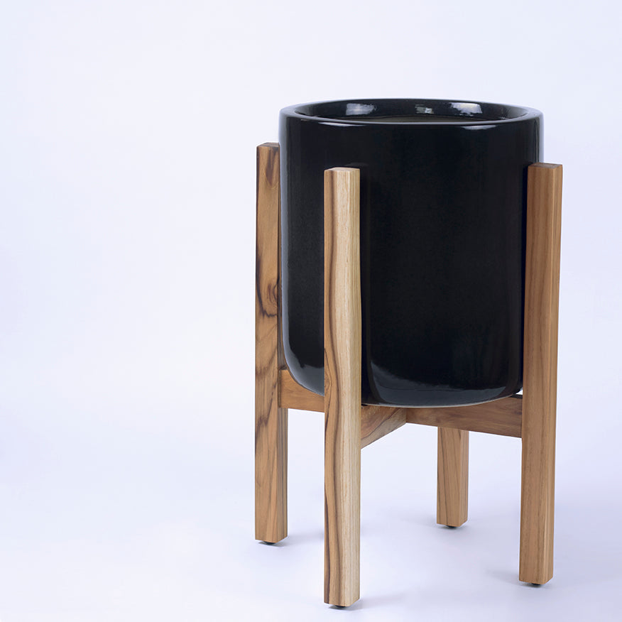 Black color Gleaming Stars Ceramic Planter with wooden stand.