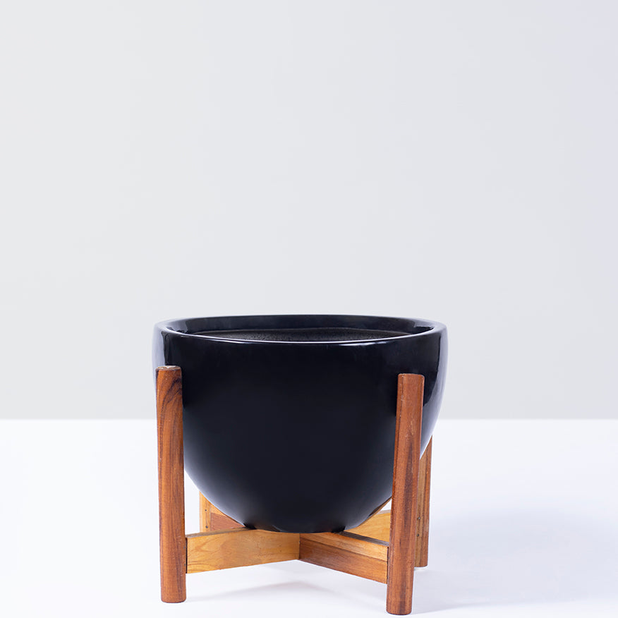 Large size Echoing Eternity-Fat Ceramic Planter in Black color with wooden stand.