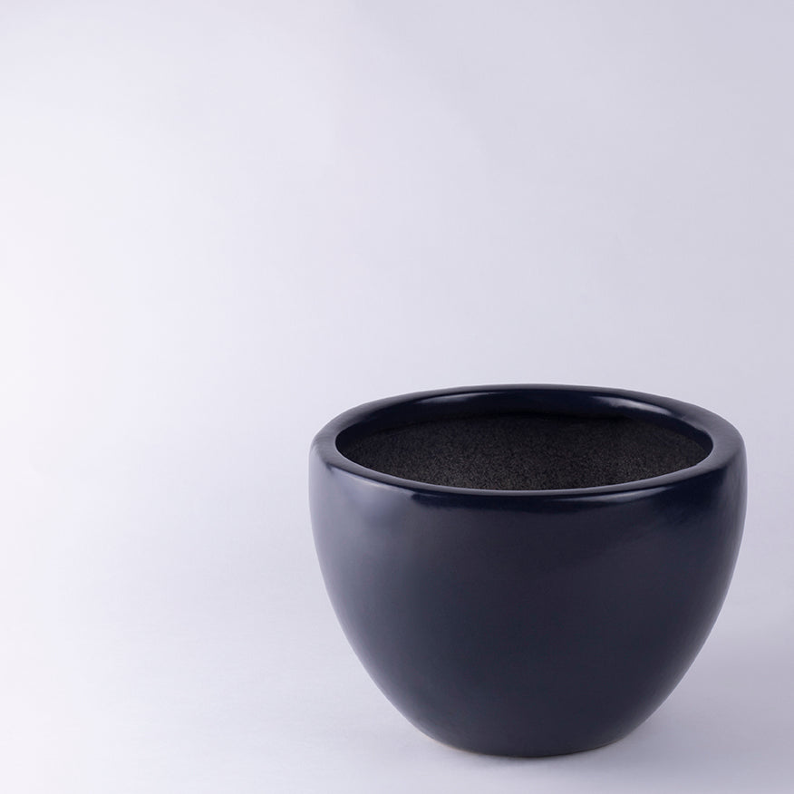 Large size Echoing Eternity-Fat Ceramic Planter in Black color.