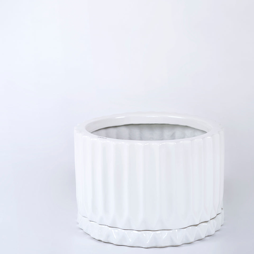 White color Fleeting Bliss ceramic planter along with plate.