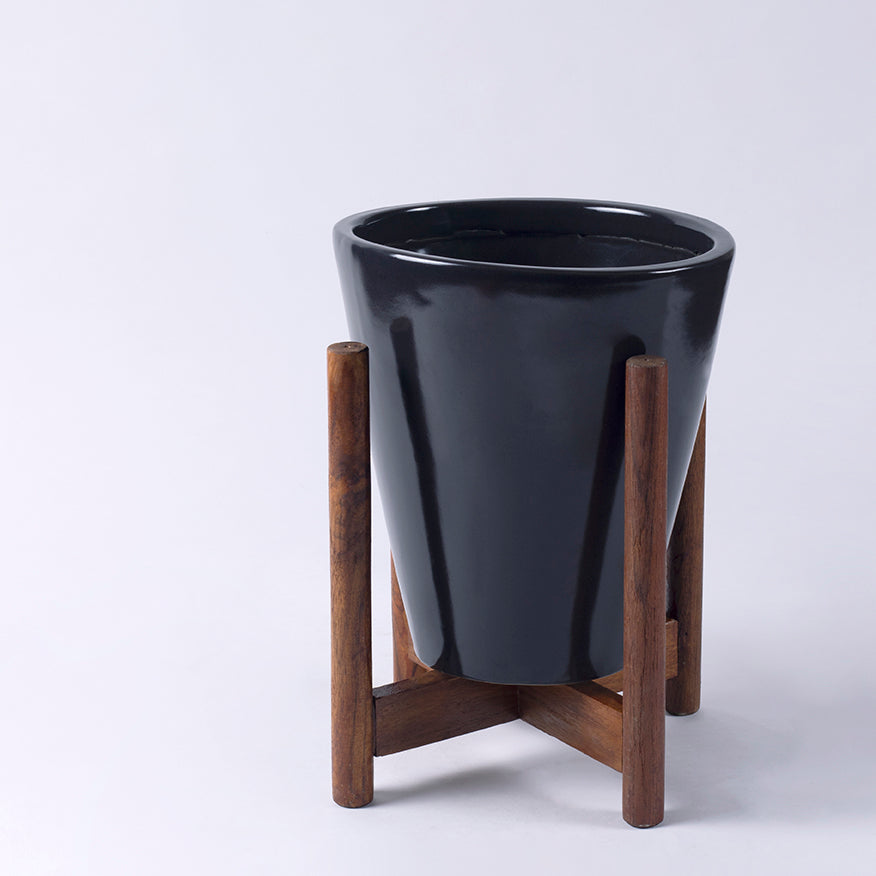 Medium Size Love Bite ceramic planter with wooden stand in Black color.